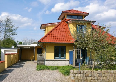 Ferienhaus Det gule Hus Hauseinfahrt